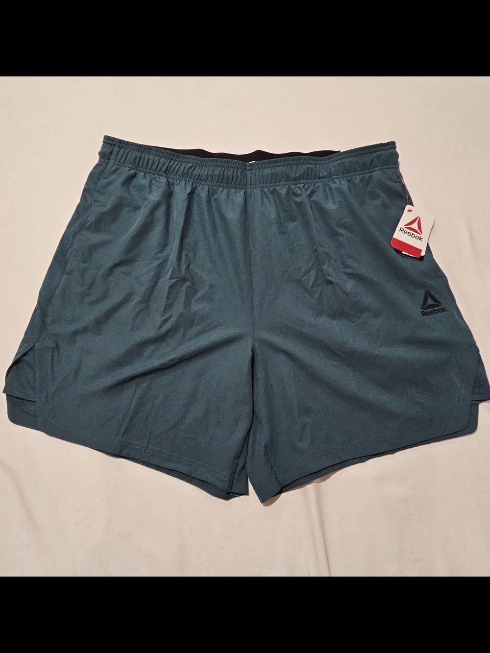 Reebok Men’s Teal Performance Running Shorts